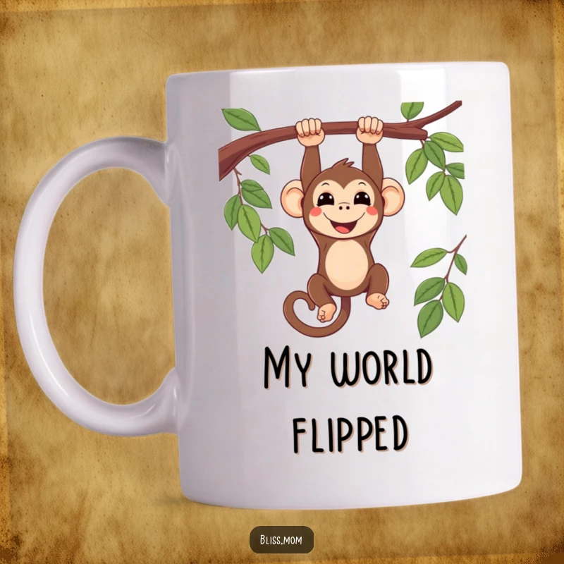 Funny smiling kawaii monkey hanging upside down from a leafy branch, depicted on a ceramic mug, radiating mischief.