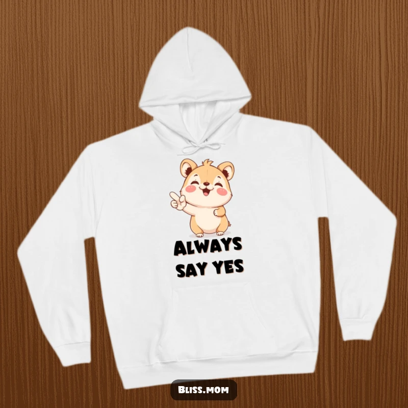 Funny Hoodie: A small, joyful animal beams while holding a YES sign, offering cozy comfort and a message of positivity.